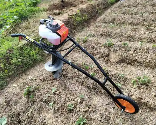 Can a Heavy Duty Earth Auger Power Head Handle Rocky Soil Conditions?